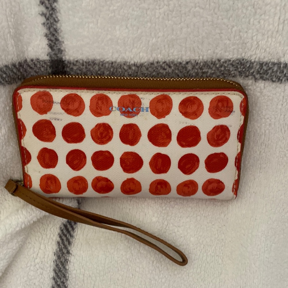 Coach polka dot wallet.   Does have some marks on the wallet as pictured